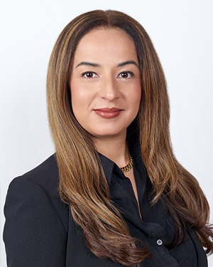 A portrait of Carly Carrillo, Paralegal/Pro Bono Coordinator for the Florida Justice Institute